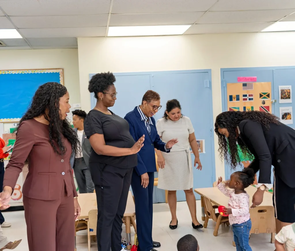 Emerita Adrienne Adams greets FOCH students